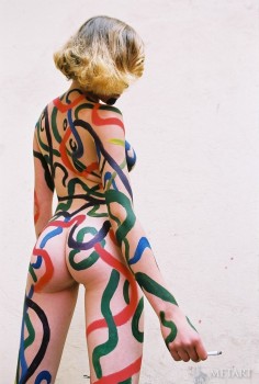 Hot models covered in some very cool body paint